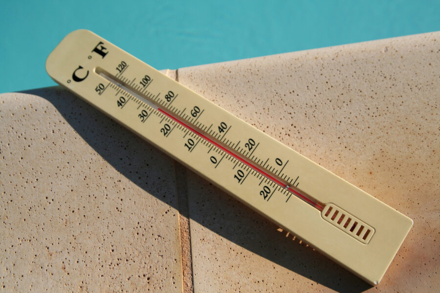 Applying Pond Shield epoxy to a concrete surface in temperatures above 50 degrees Fahrenheit